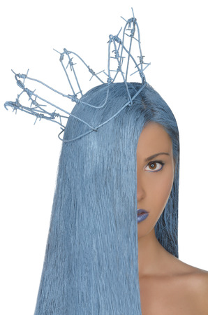 vertical portrait of woman with long blue hair and crown isolated on whiteの写真素材