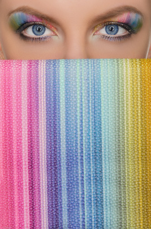 Vertical multicolor picture of the eye and wallet closeupの写真素材