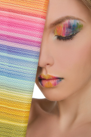 beautiful face with bright face-up and purse closeupの写真素材