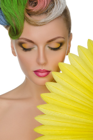 Portrait of charming woman with bright makeup isolated on whiteの写真素材