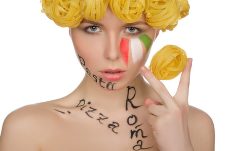 woman with pasta and symbols of Italy isolated on whiteの写真素材