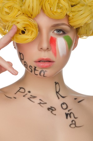 Beautiful woman with hair pasta and symbols of Italy isolated on whiteの写真素材