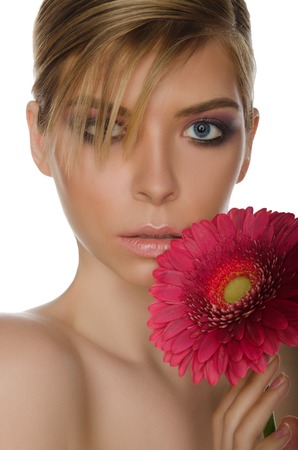 beautiful woman with red chrysanthemum isolated on whiteの写真素材