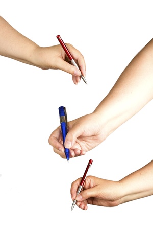 woman s hand holding a pen on a white backgroundの写真素材