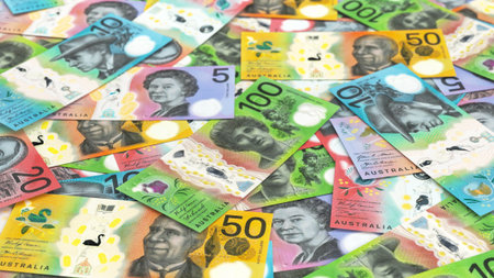 Australian dollar banknotes spread out in a colorful pattern representing currency, savings, and finance.の写真素材