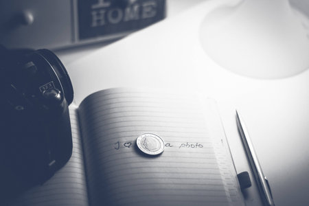 I love photography concept with camera, pen and notebookの写真素材