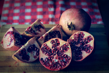 Picture of pomegranate, with a home style backgroundの写真素材