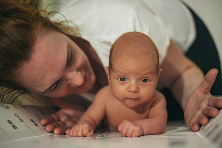 Shot of a happy mother bonding with her baby boy after bathing at homeの写真素材