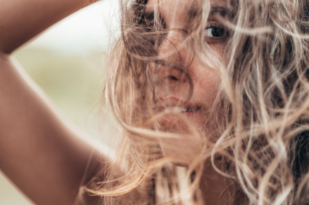 Portrait photo of a beautiful girl posing outside