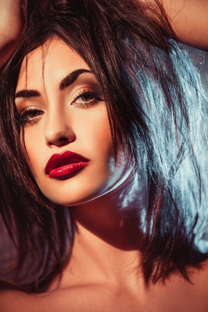 Beauty fashion dark hairy model with red lipsの写真素材