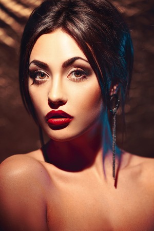 Beauty fashion dark hairy model with red lipsの写真素材