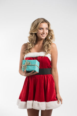 Sexy young blonde woman like Santa Clausの写真素材