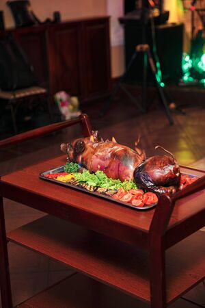 young roasted piggy pig being served at the celebration.の写真素材
