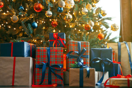 Shot of a gifts boxes under christmas tree.の写真素材