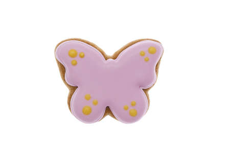 Sweet gingerbread cookies decorated with icing in the form of a butterfly isolated on white background. Easter decoration.の写真素材