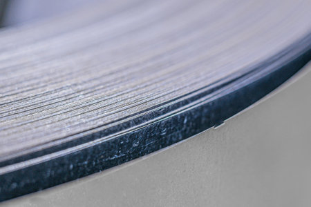 Iron and steel coil detail, store factory. Metallurgical factory. Construction.の写真素材