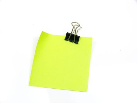 Leaf with a clothespin on a white backgroundの写真素材