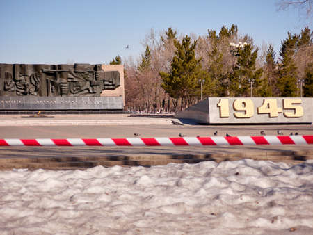 Karaganda, Kazakhstan - 1nd April, 2020 -The streets of the city are quarantined closed due to COVID-19 or Coronavirus outbreak lockdown. Information warning sign about quarantine measures in public placesのeditorial素材