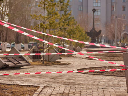 Karaganda, Kazakhstan - 1nd April, 2020 -The streets of the city are quarantined closed due to COVID-19 or Coronavirus outbreak lockdown. Information warning sign about quarantine measures in public placesのeditorial素材