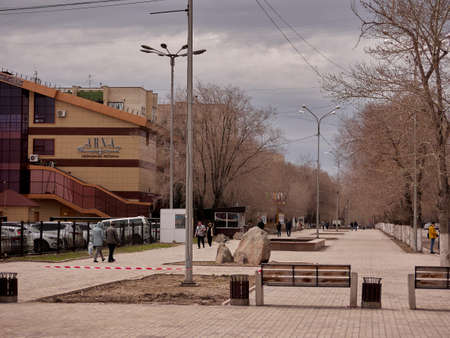 The streets of the city are quarantined closed due to COVID-19 outbreak lockdown. Information warning sign about quarantine measures in public places.のeditorial素材