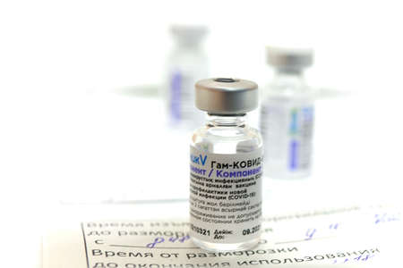 Karaganda, Kazakhstan - 10.04.2021: A medical worker vaccinates a people with the Russian Sputnik-V (Gam-Covid-Vac) COVID-19 vaccine at hospitalのeditorial素材