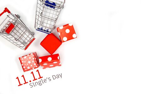 Online shopping of China, 11.11 single's day sale concept. The red gift boxes on white background with copy space for text 11.11 single's day sale.の写真素材