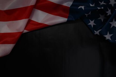 Close up of waving national usa american flag on black background with copy space for text. Concept of 4th of July or Memorial Day.の写真素材