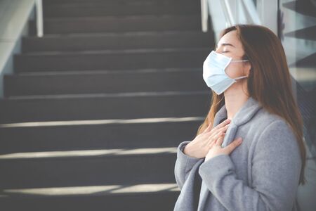 Virus mask Asian woman travel wearing face protection in prevention for coronavirus. Sick woman in...