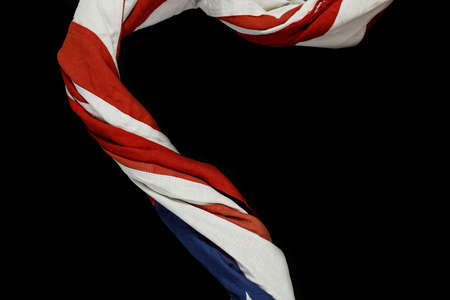 Close up of waving national usa american flag on black background with copy space for text.の写真素材