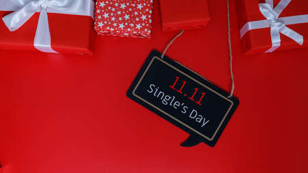 Online shopping of China, 11.11 single's day sale concept. The red gift boxes on red background with copy space for text 11.11 single's day sale.の写真素材