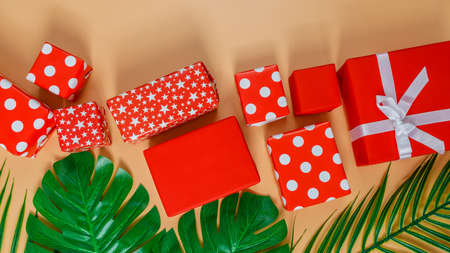 Frame of red gift boxes on yellow background with copy space for text 11.11 single's day sale. Thanksgiving day concepts, Christmas Concepts and New year concepts.の写真素材