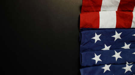 Close up of waving national usa american flag on wooden background with copy space for text.の写真素材