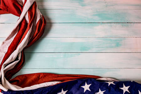 Close up of waving national usa american flag. The flag of the United Sates of America on a grey...