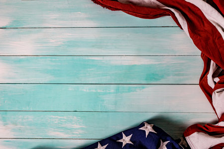 Close up of waving national usa american flag. The flag of the United Sates of America on a grey...