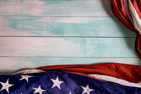 Close up of waving national usa american flag. The flag of the United Sates of America on a grey...