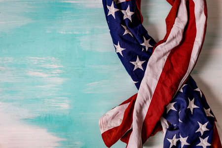 Close up of waving national usa american flag. The flag of the United Sates of America on a grey plank background with memorial day.の写真素材