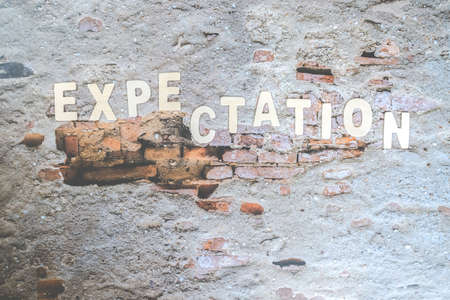 The expectations word on the wall. Business Concept image. Expectation Prediction Hope Strategy...
