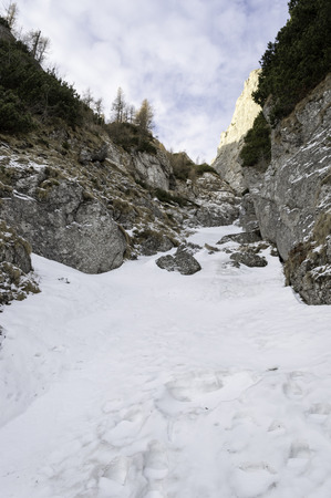 rocky trail Bucegi Mountains Landscape in winterの写真素材