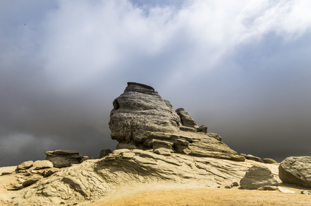 Sphinx With Dramatic Clouds Over Bucegi Mountains In Late Autumnの写真素材