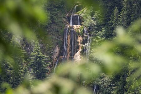 High waterfall in spring mountain