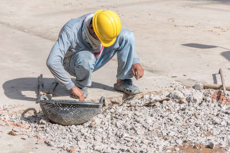 Construction work Construction worker working in the sun during the day Construction work, Brick...
