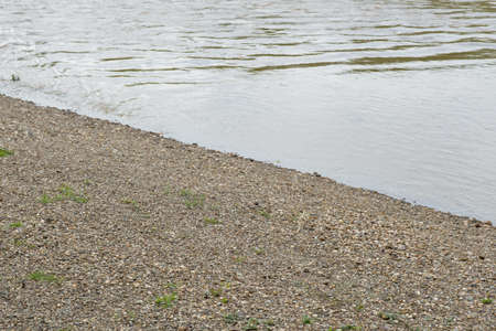 A beautiful river beach with pebbles stone