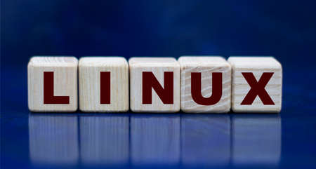LINUX - abbreviated word on cubes on a beautiful blue backgroundの写真素材
