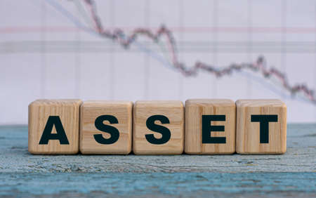 ACTIVE - word on wooden cubes on a light graphic background. Business concept.の写真素材