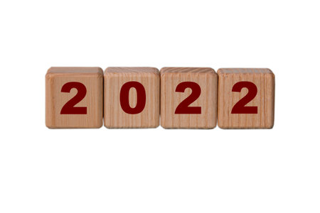 2022 - red numbers on wooden cubes isolated on a white background. New Year's Conceptの写真素材