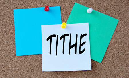 TITHE - word on colorful pieces of paper attached to the note board. info conceptの写真素材