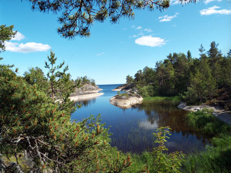 scenery. Russia. Karelia. Karelian skerries. lake ladoga. Channel of lake Ladoga with stony banks. northern nature. Travel to Karelia.の写真素材