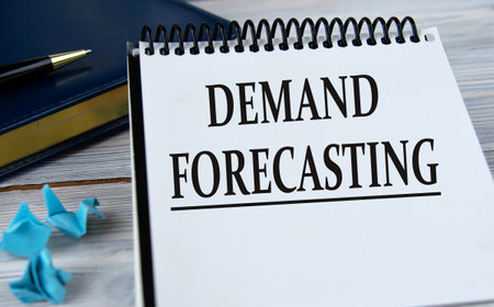DEMAND FORECASTING - words in a notebook on the background of a weekly and a pen. information conceptの写真素材