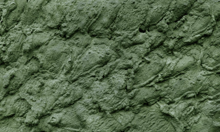 Green cement texture, concrete wall surface, colored backgroundの写真素材