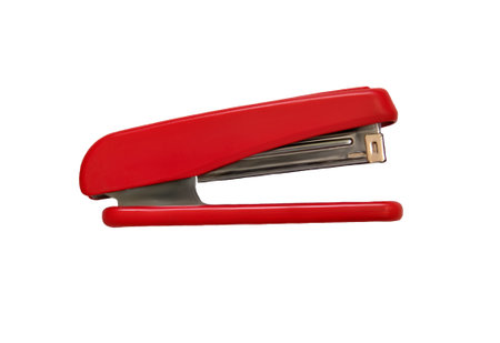 Red color stapler close-up isolated on white backgroundの写真素材